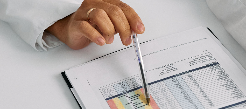 Clinician reviewing a medical report